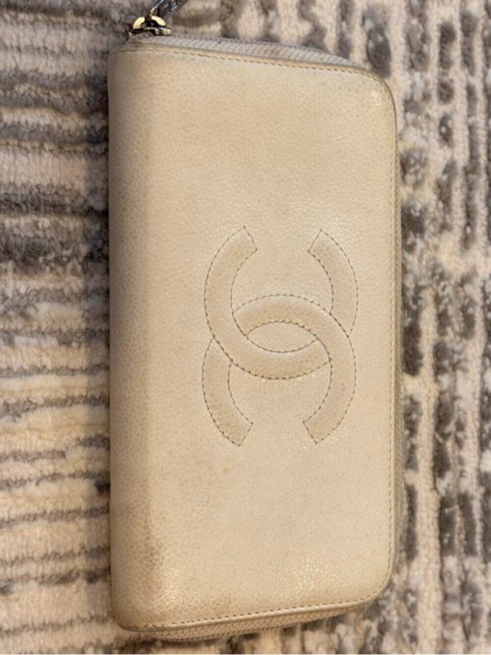 Authentic Chanel cream caviar leather zip around long wallet embossed CC logo